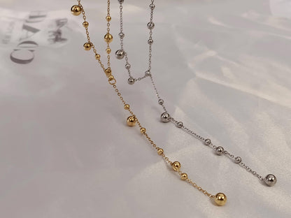 Collar largo de cuentas bolitas Forma Y versatil de acero inoxidable baño de oro de 18K para mujeres