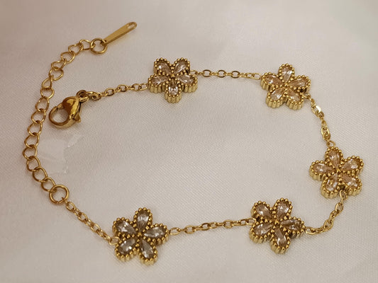 Pulsera con flores circonitas acero inoxidable bañado en oro 18K para mujeres