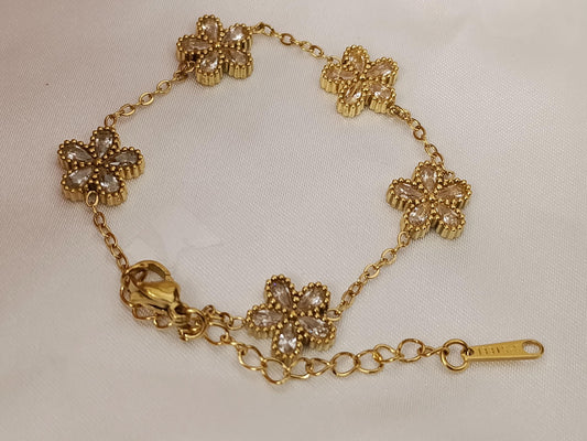 Pulsera con flores circonitas acero inoxidable bañado en oro 18K para mujeres
