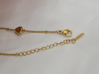 Pulsera con corazones circonitas verdes acero inoxidable bañado en oro 18K para mujeres