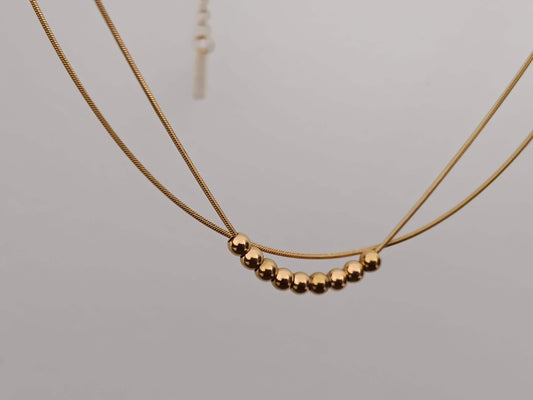 Collar Doble Cadena Serpiente con Bolas Efecto Espejo en Oro 18K (PVD) - Acero Inoxidable para mujeres