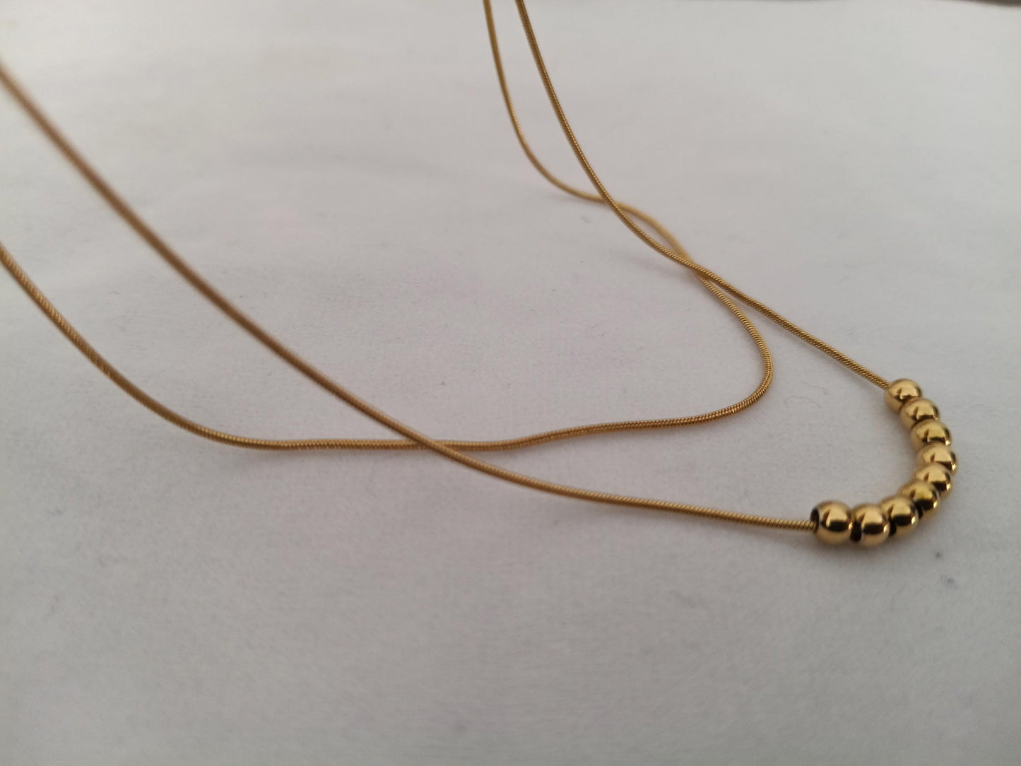 Collar Doble Cadena Serpiente con Bolas Efecto Espejo en Oro 18K (PVD) - Acero Inoxidable para mujeres