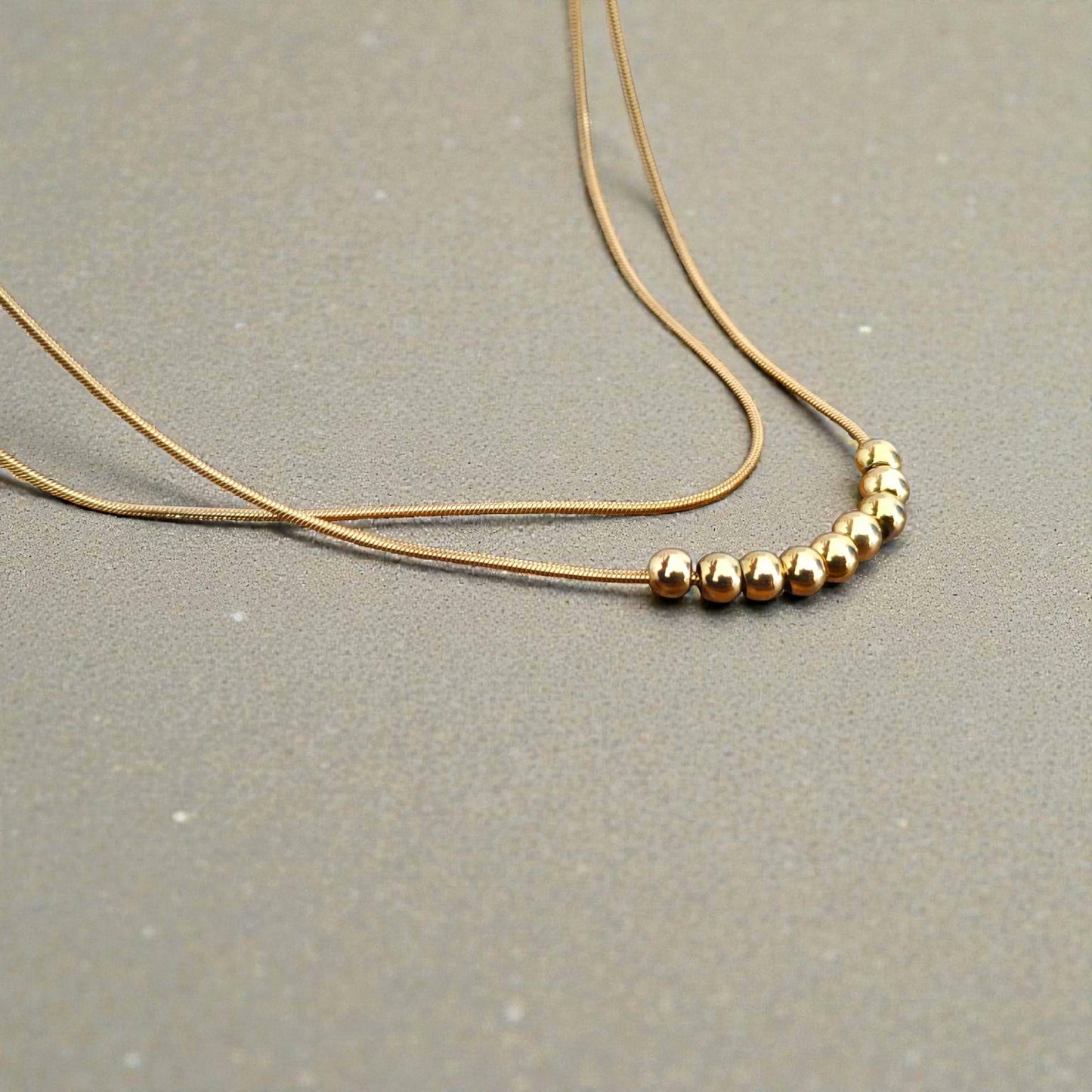 Collar Doble Cadena Serpiente con Bolas Efecto Espejo en Oro 18K (PVD) - Acero Inoxidable para mujeres