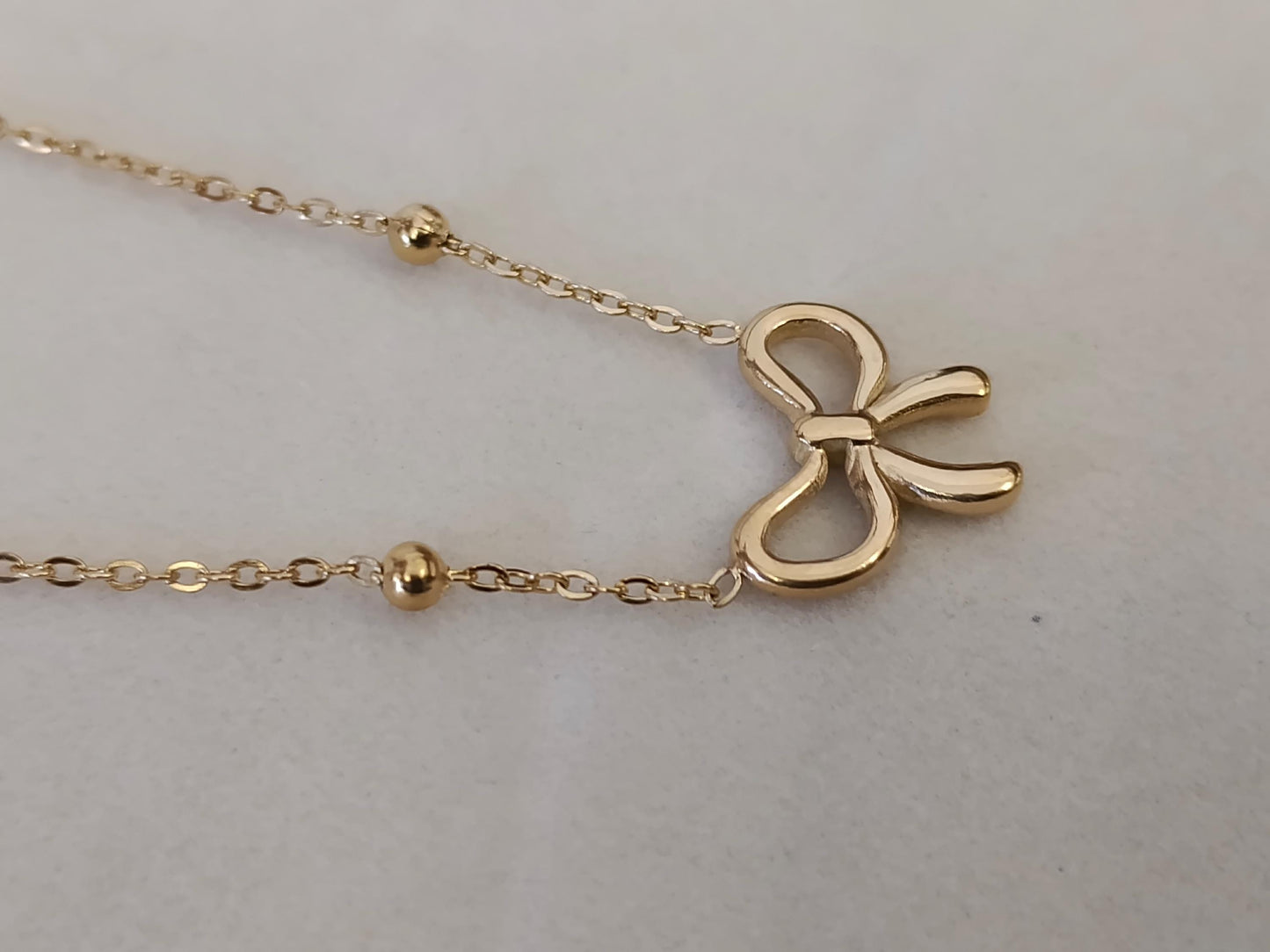 Collar de cuentas con Colgante de Lazo en Acero Inoxidable y Baño de Oro 18K (40cm + Extensión) regalo para ella